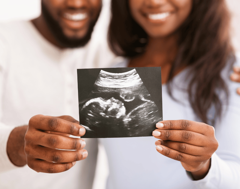 Couple Holding Sonogram